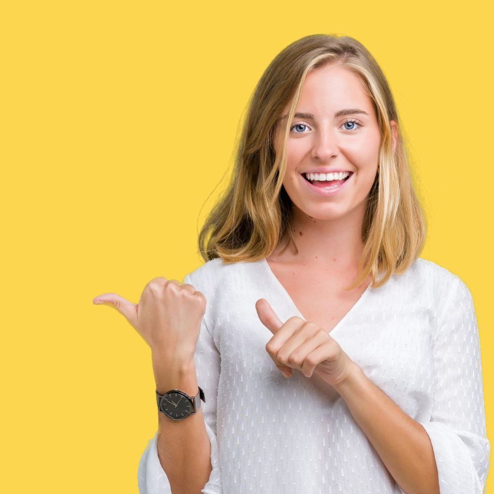 A happy young black woman stands confidently with a tape measure around her waist, holding a clear glass of water. Her activewear suggests a focus on health and fitness